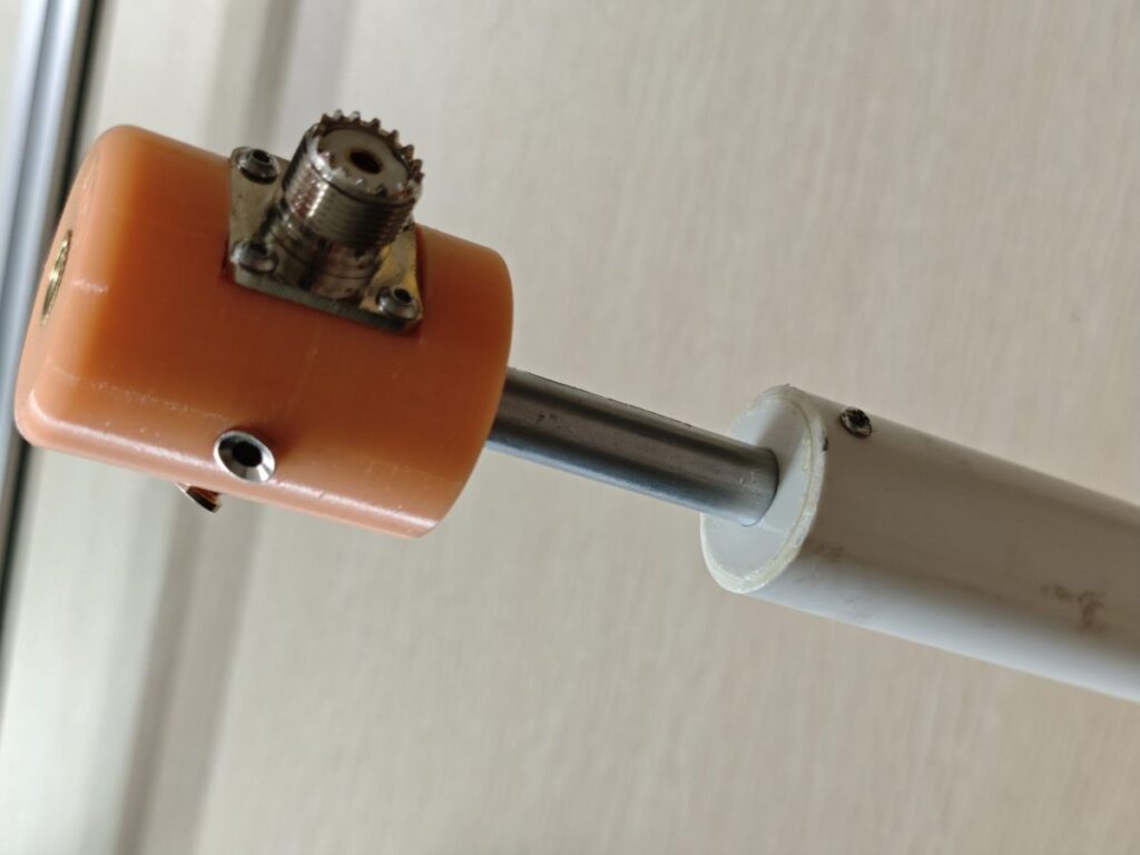 mounting the antenna base on the ground stake through the spike