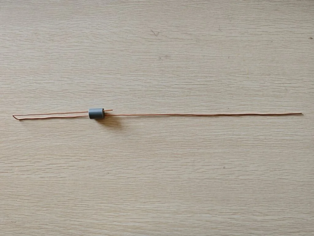 Copper J-Pole antenna wire with spacer installed before final assembly