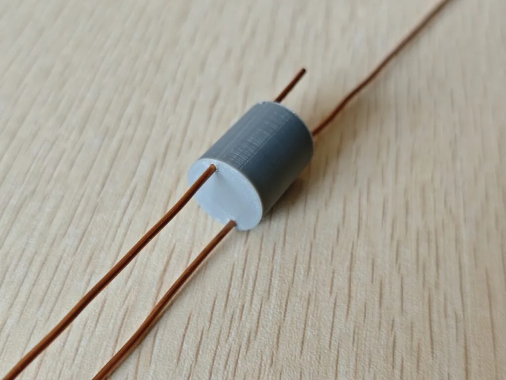 3D printed spacer installed on copper wire for homemade J-Pole antenna