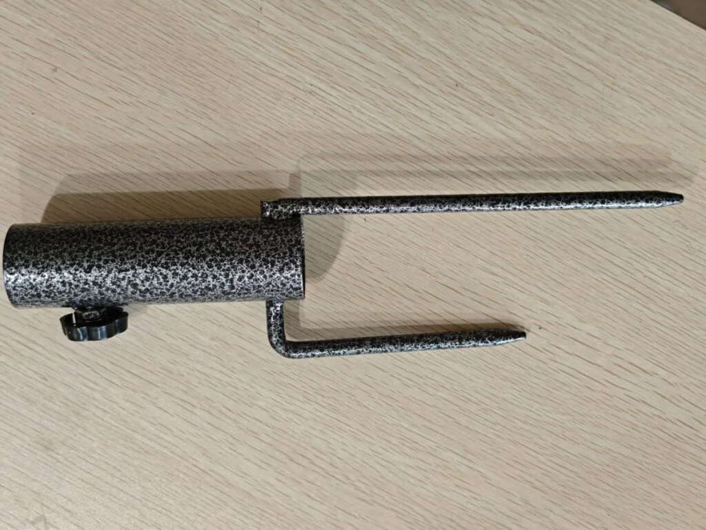 the umbrella ground spike used to mount the ground elevated vertical above the ground